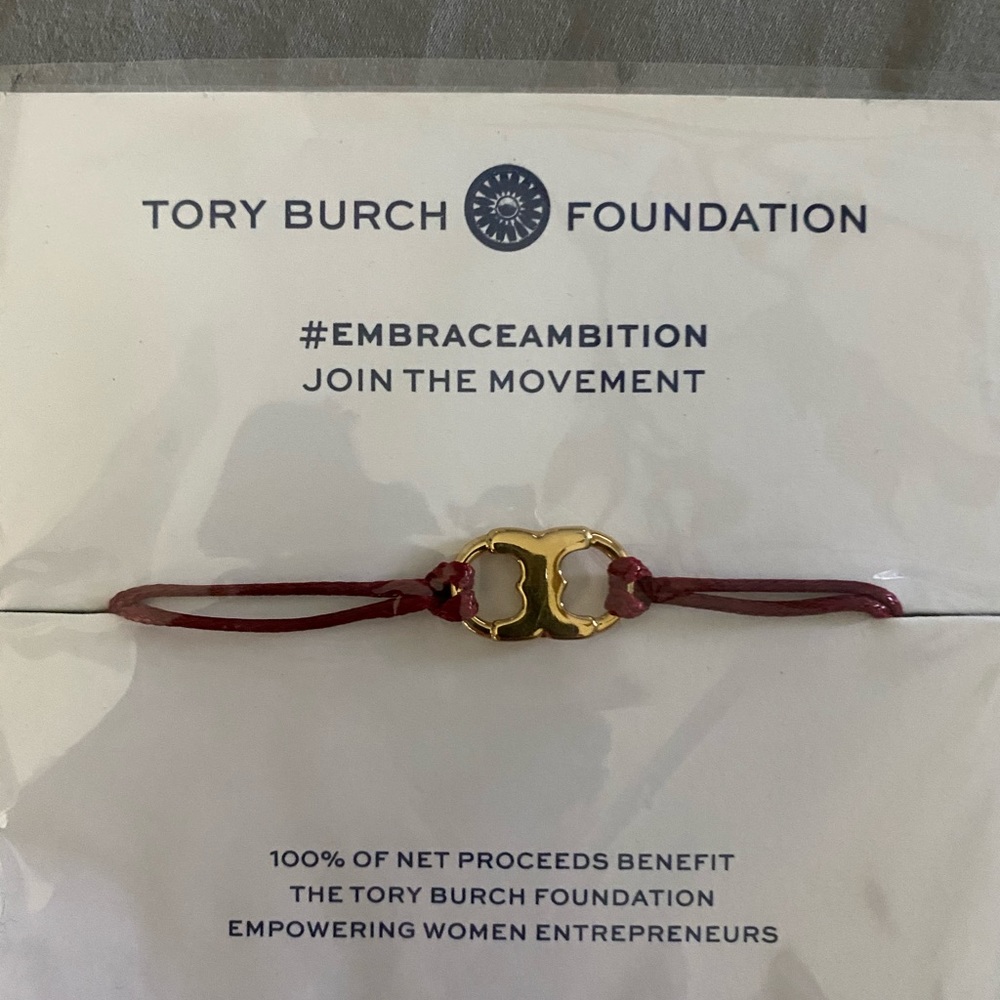 Tory Burch “join the movement” bracelet.